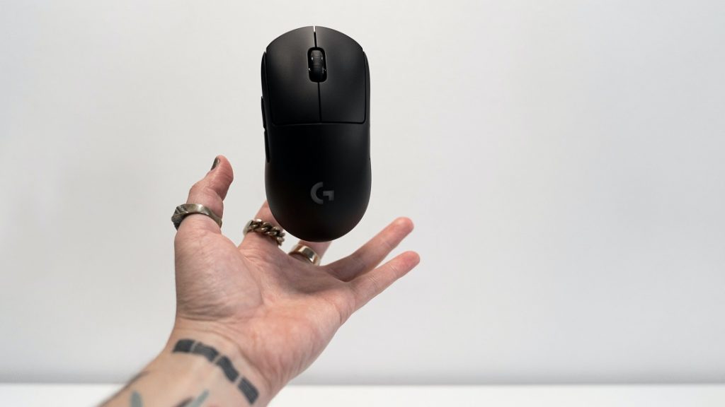 man holding a gaming mouse